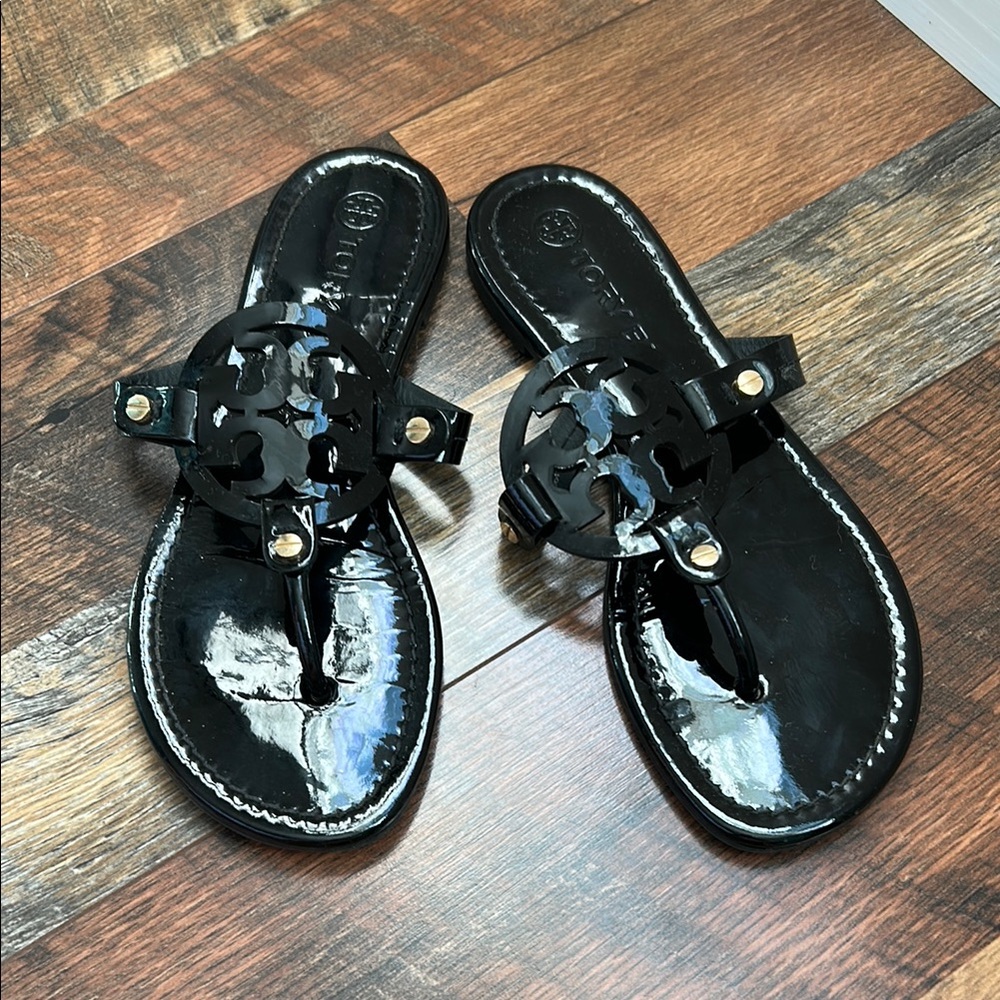 Tory Burch Black Sandals with Flower Embellishments